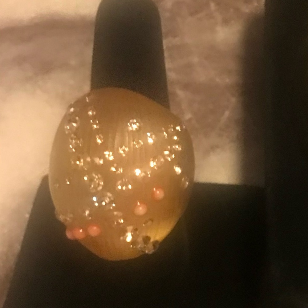 Alexis Bittar golden beige lucite ring incrusted w/ coral specks & crystals.
